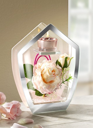 Teelichthalter aus Glas mit Rose im Inneren