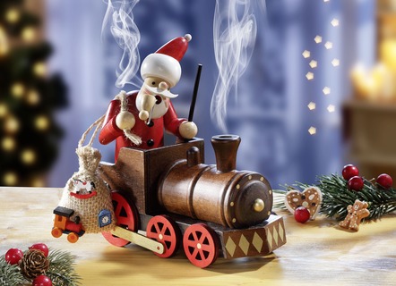 Räucherfigur Weihnachtsmann in einer Lokomotive»