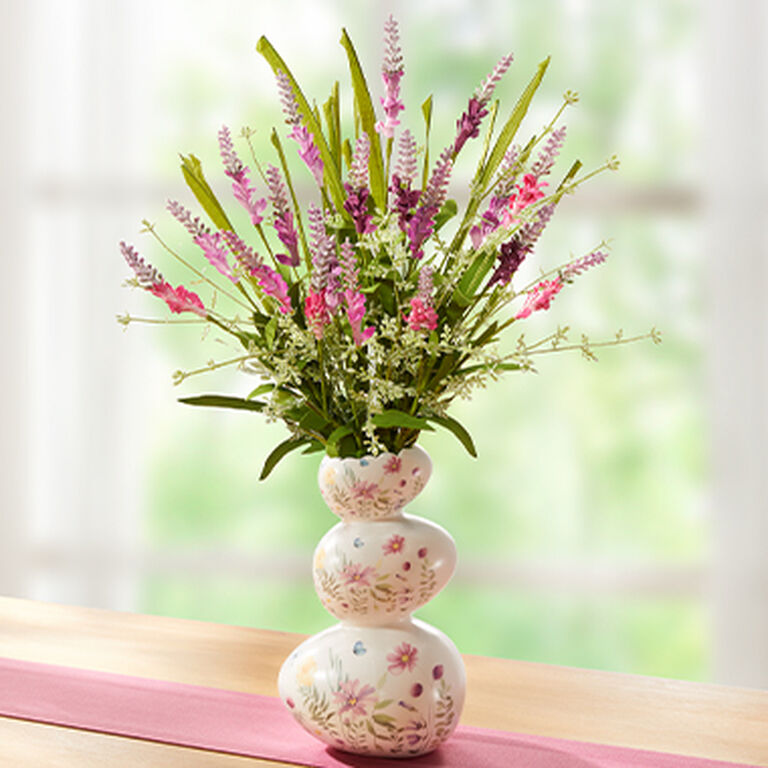 Bunte Kunstpflanzen in der Vase