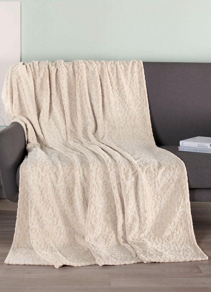 Wohndecke mit Leoparden-Optik 