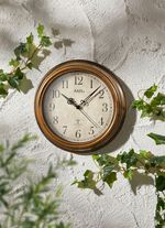 Funk-Wanduhr mit bronziertem Geh&auml;use 