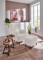 Ohrenbackensessel mit Hocker 