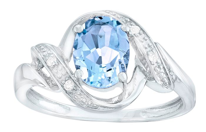 Moderner Damenring mit Blautopas und echt Weisstopas 