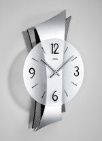Hochwertige Wanduhr aus Messing mit geschwungener Rückwand 