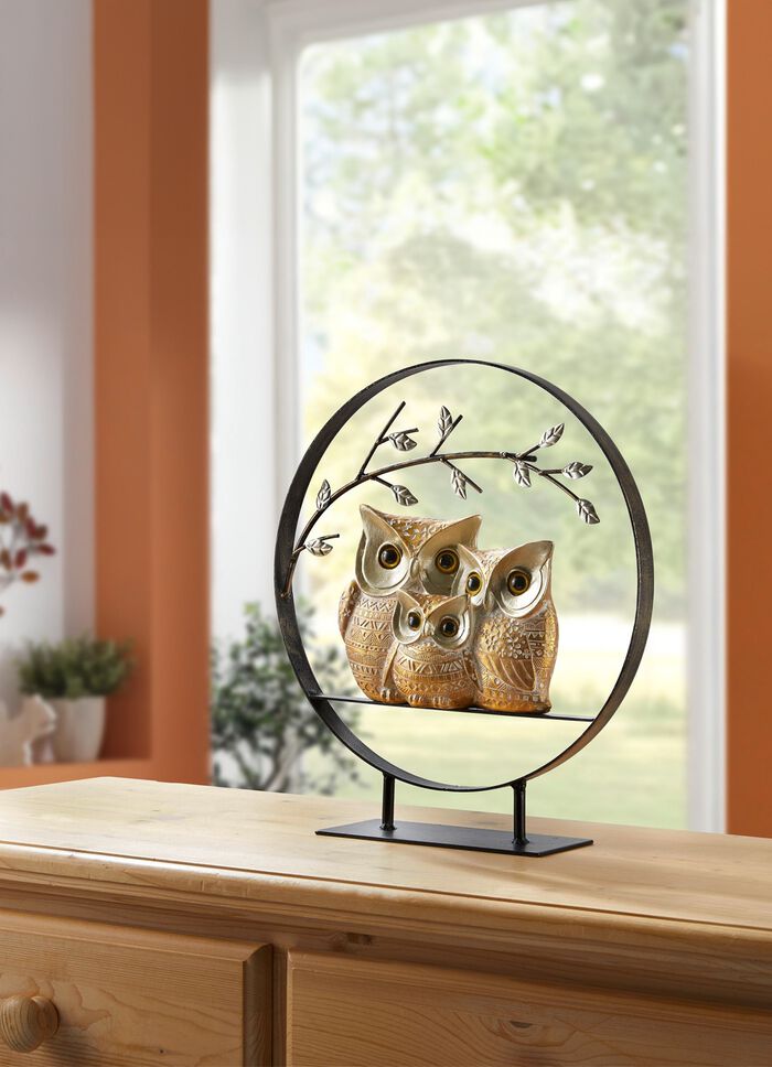 Dekorative Eulenfamilie unter Zweig 