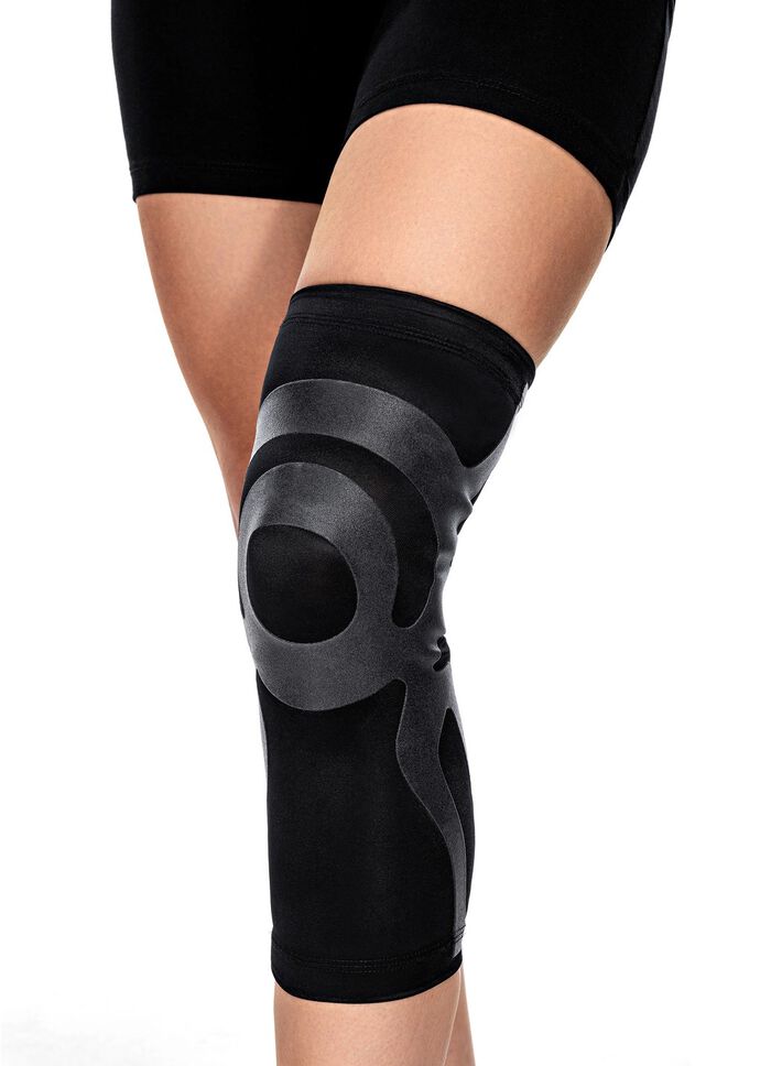 Kniebandage mit integrierten Tapes 
