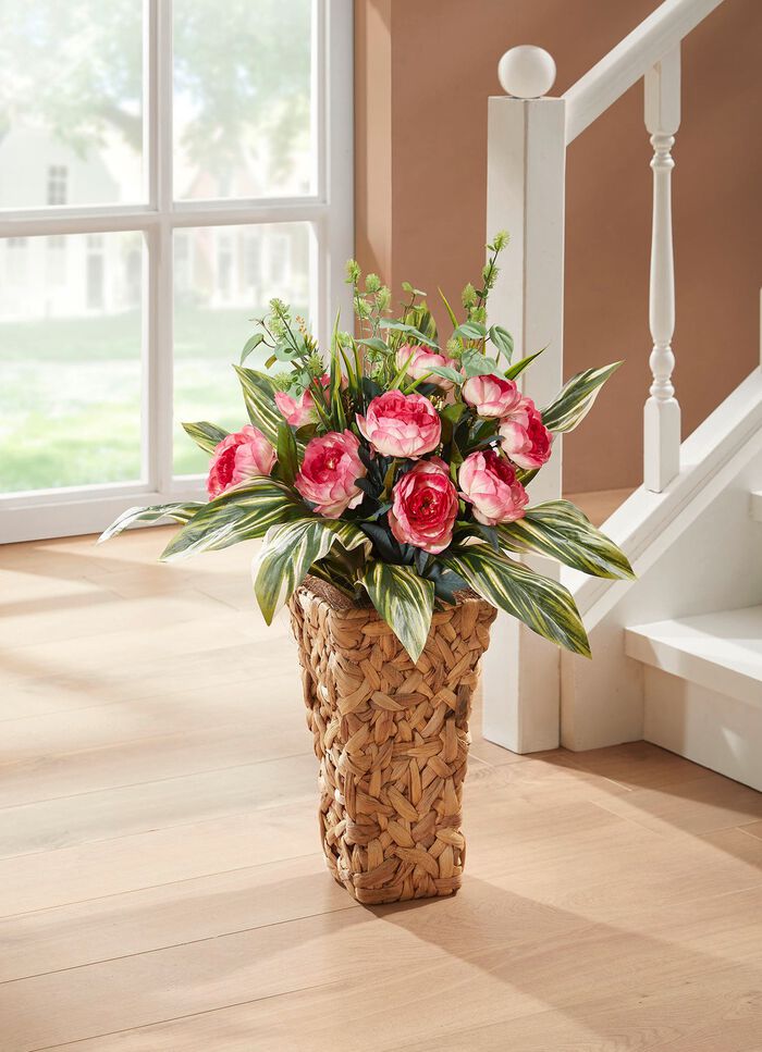 Bauernrosen in Wasserhyazinthen-Korb 