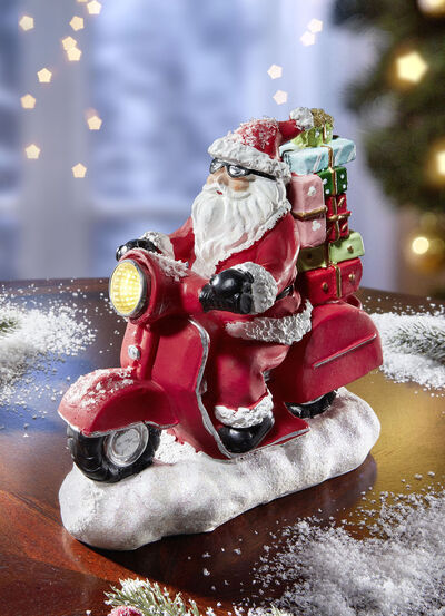 Beleuchteter Samichlaus auf Roller 
