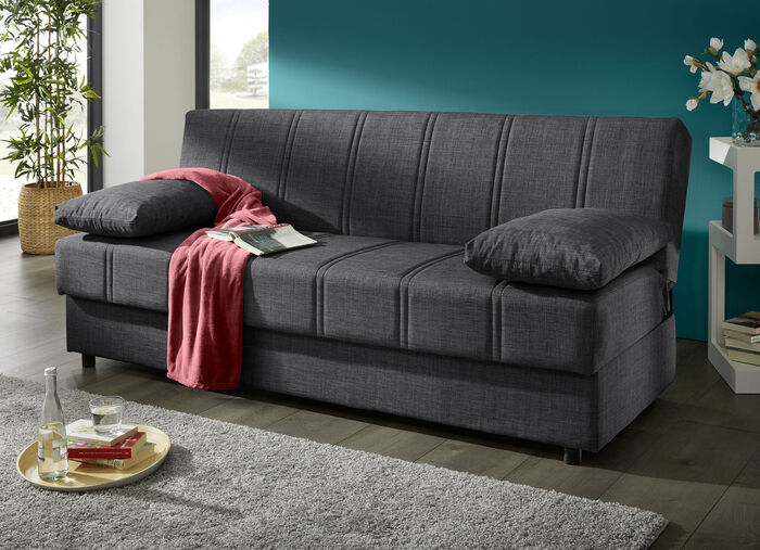 Frei im Raum aufstellbares Schlafsofa mit Dekokissen und Bettkasten ANTHRAZIT