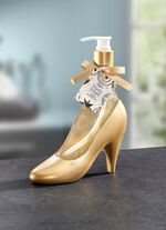 Handseife in goldfarbenen Pumpspender  