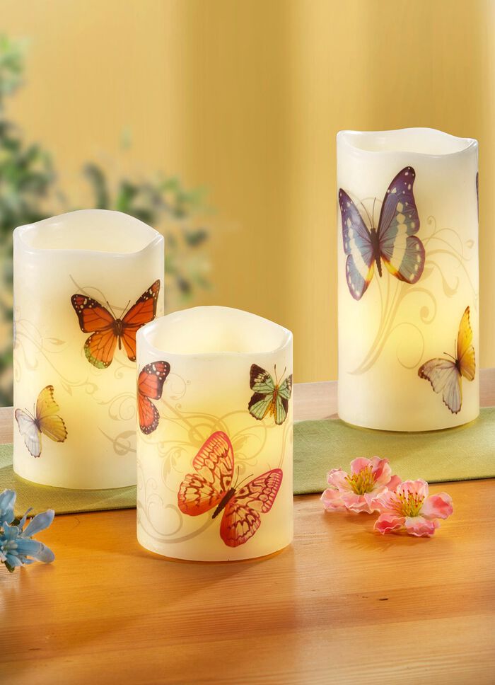 LED-Echtwachskerzen mit fr&uuml;hlingshaften Schmetterlingssmotiv, 3er-Set 