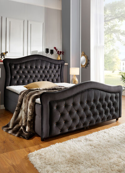 Boxspringbett mit gepolsterten Kopf- und Fußteil 