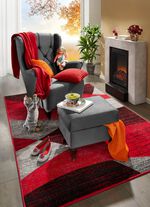 Ohrenbackensessel mit Hocker 